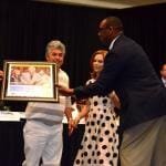 Receiving award on stage